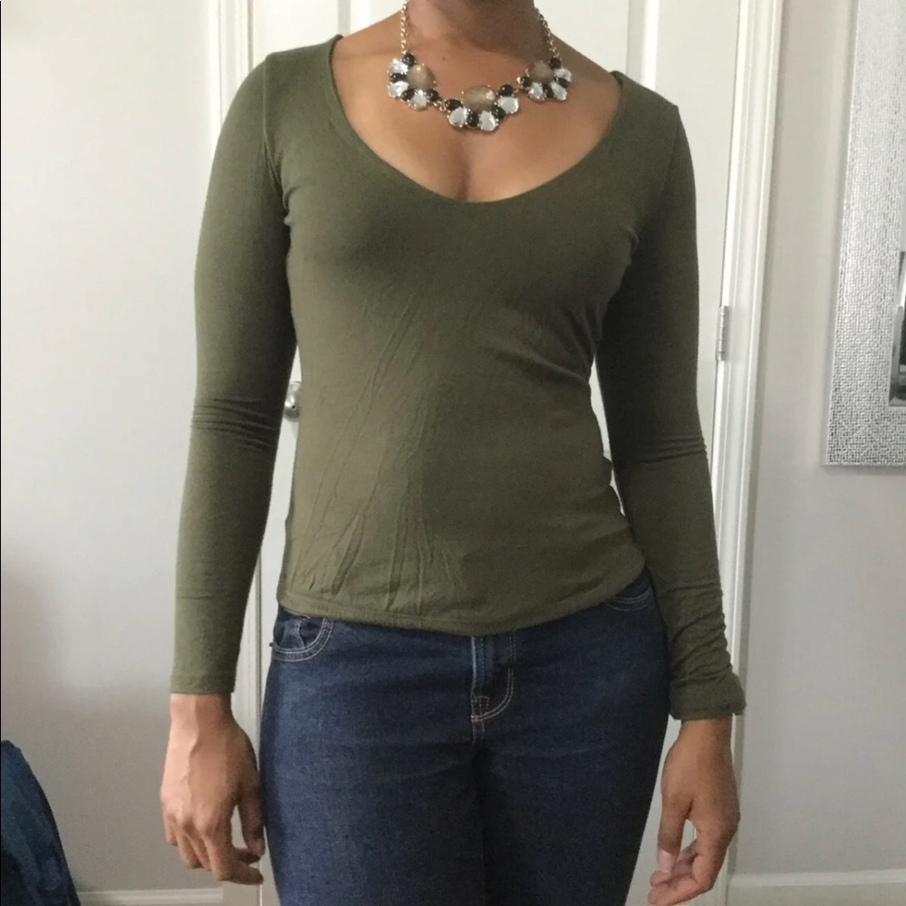 Green long sleeve shirt.